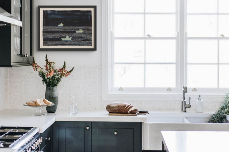 blue kitchen art print with grey kitchen units and white stone worktop