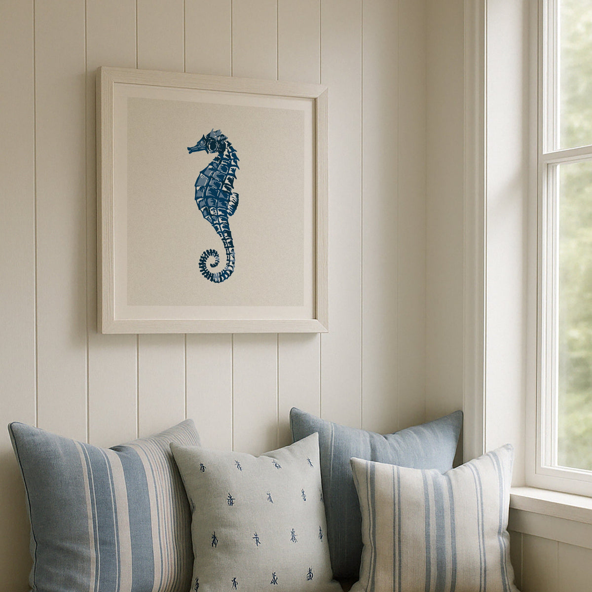 seahorse art print framed on wall above bench seat - framed seahorse painting