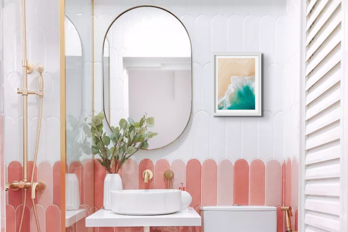 Aerial Beach photograph as a bathroom art print in a pink tiled bathroom
