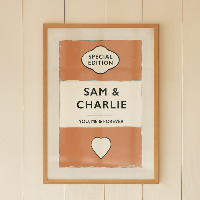 Personalised wedding/engagement print. Framed artwork with 'Special Edition' and 'Sam & Charlie' text in a room with a window and wicker chair.