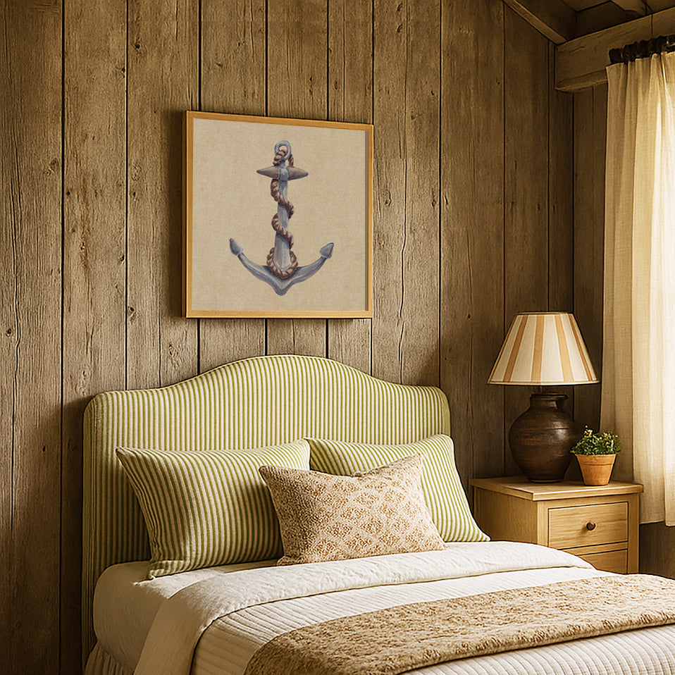 Bedroom with anchor art print, wooden walls, a bed with green headboard and beige bedding, and a lamp on a nightstand.