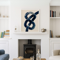 abstract line art print framed in living room above fireplace