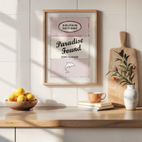 quote print on book cover in kitchen. vintage style book cover art print with quote on in pink.