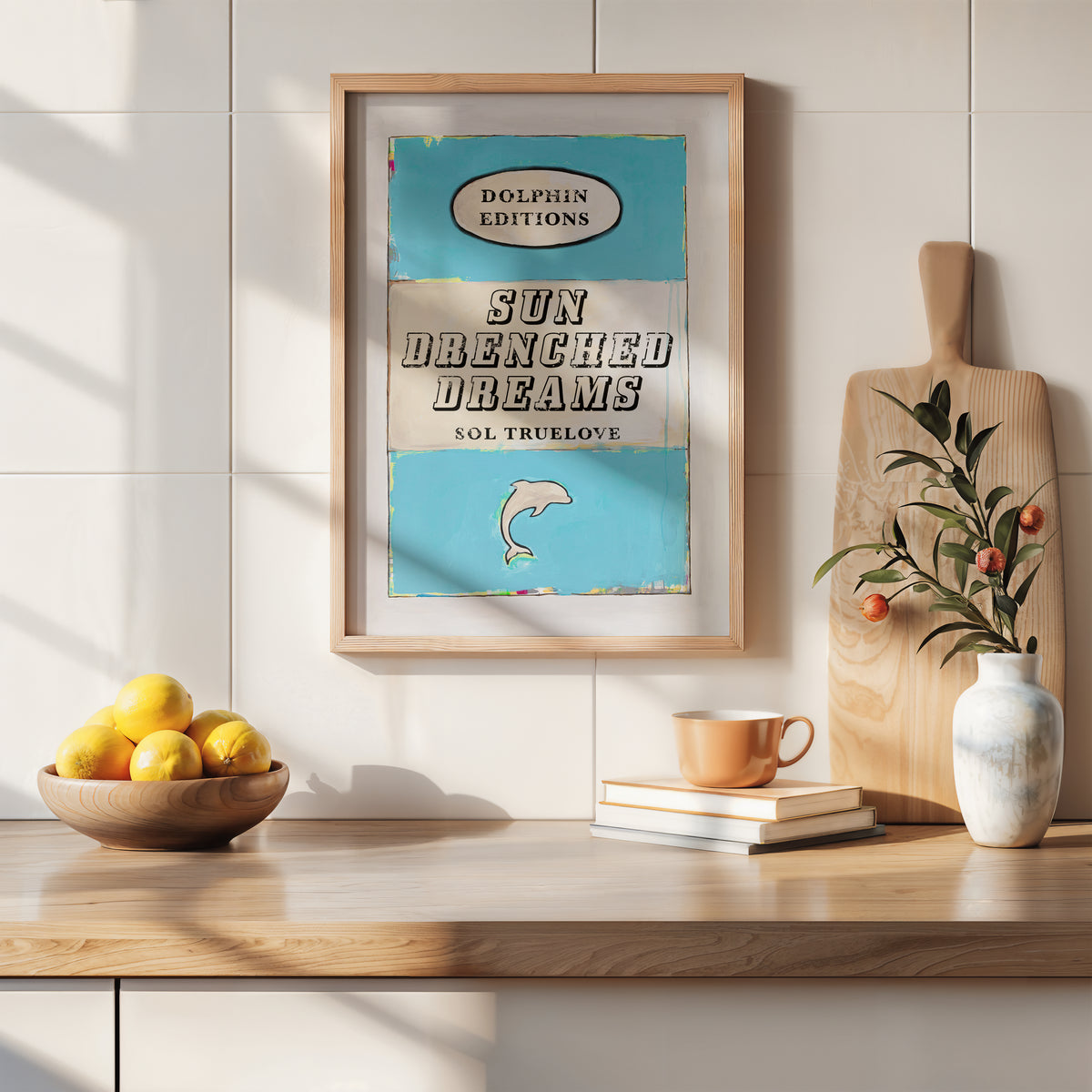quote print on book cover in kitchen. vintage style book cover art print with quote on blue.