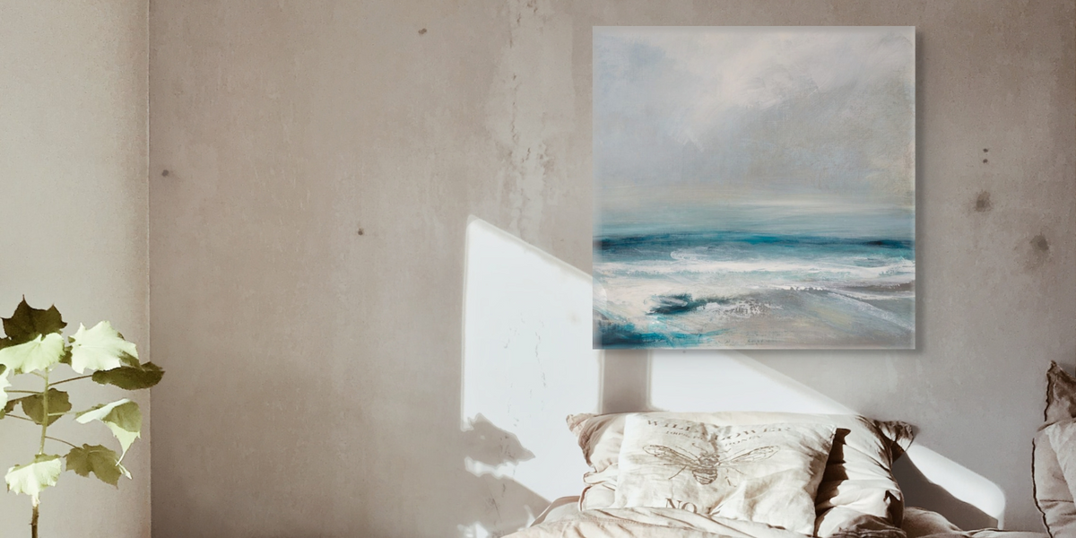 sea painting collection header showing a print of the sea above a bed in a coastal bedroom - beach print