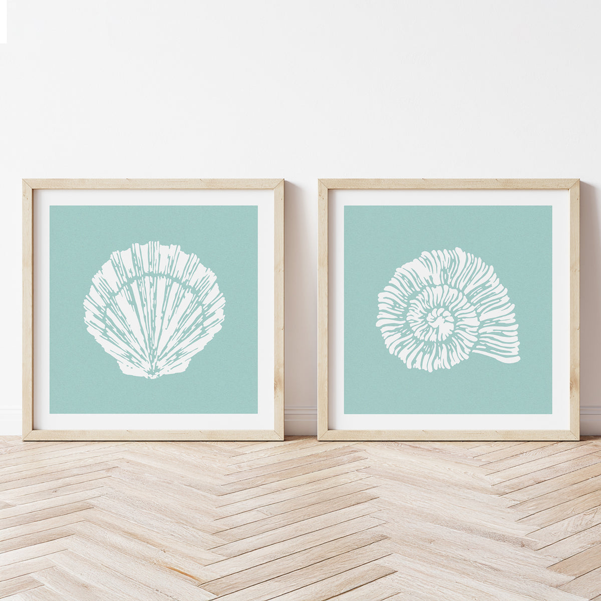 set of two shell art prints - framed shell prints on aqua blue background