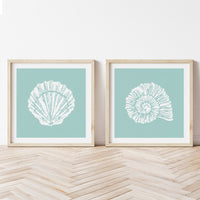 set of two shell art prints - framed shell prints on aqua blue background