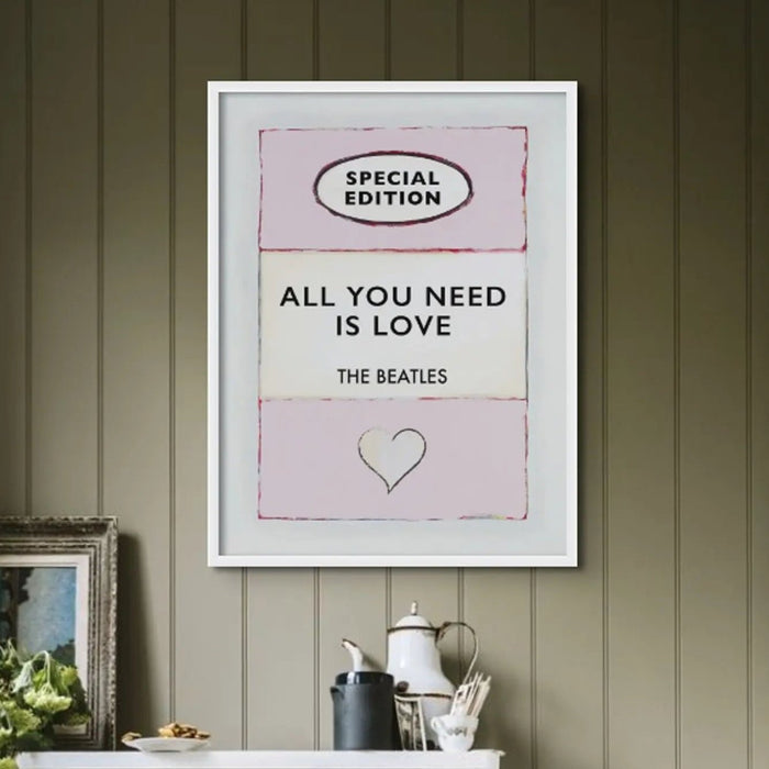 Beach House Art | All You Need is Love (Pink) | Lyric Book Cover Art Print in white frame in an olive coloured kitchen