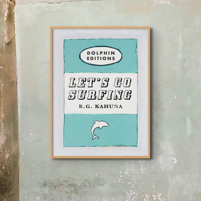 framed print of the vintage book cover art poster "Let's Go Surfing" in aqua blue.