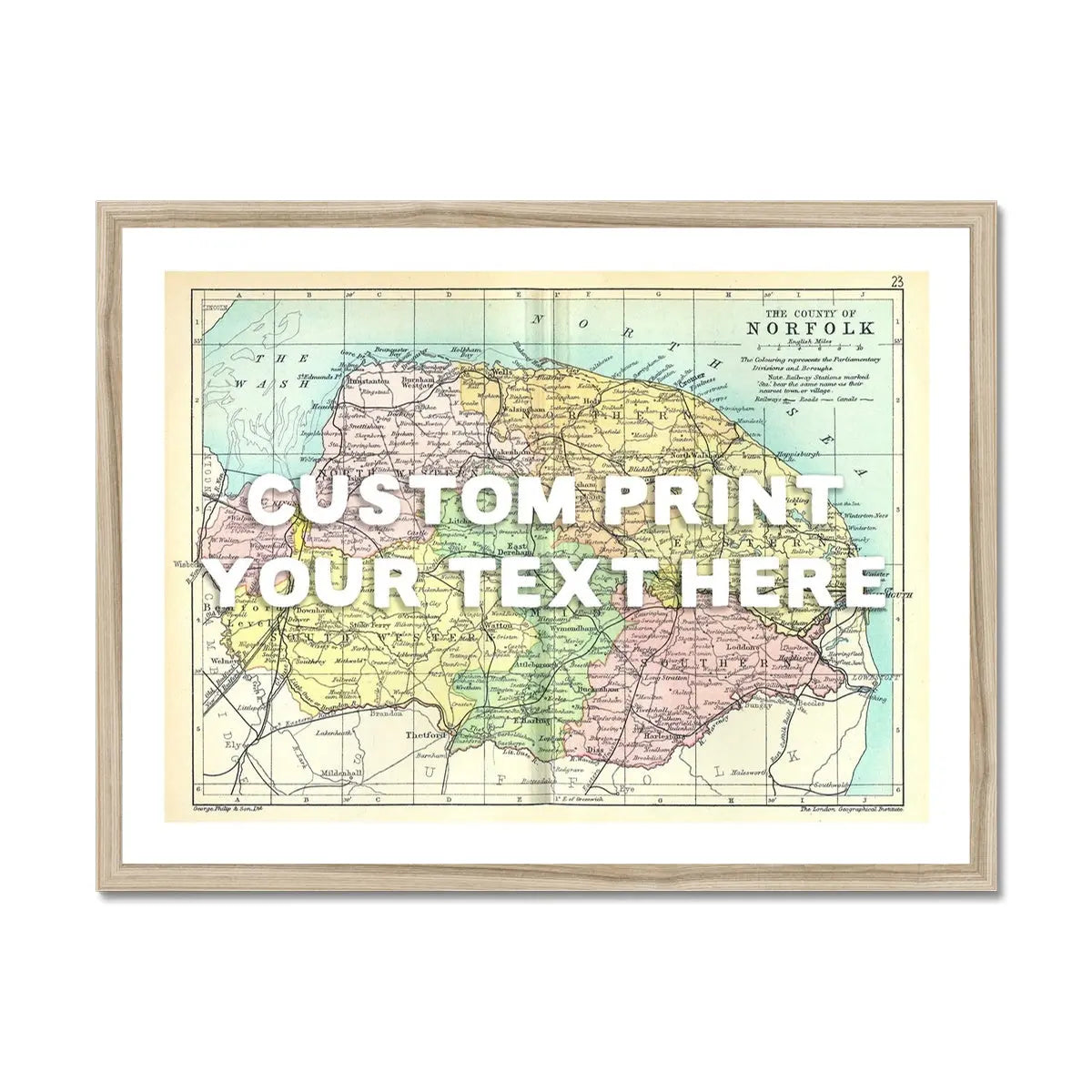 Coastal wall art featuring a personalised vintage map print of Norfolk with white font - Framed wall art