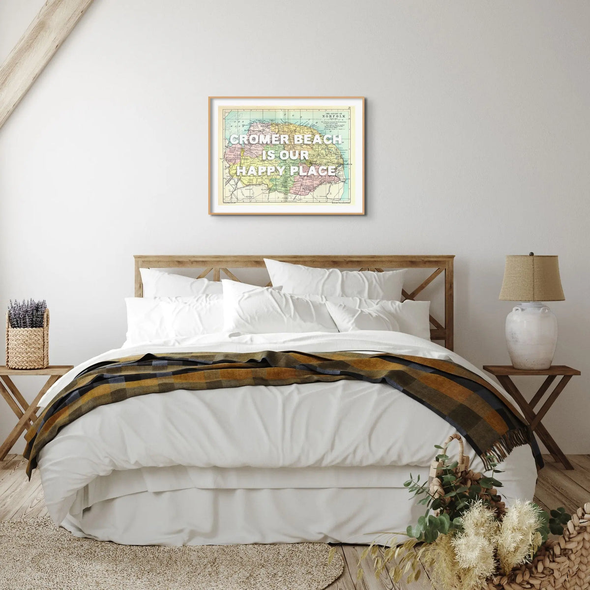 Coastal wall art featuring a personalised vintage map print of Norfolk with white font - Framed wall art