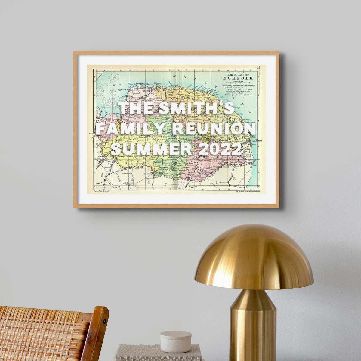 Coastal wall art featuring a personalised vintage map print of Norfolk with white font - Framed wall art