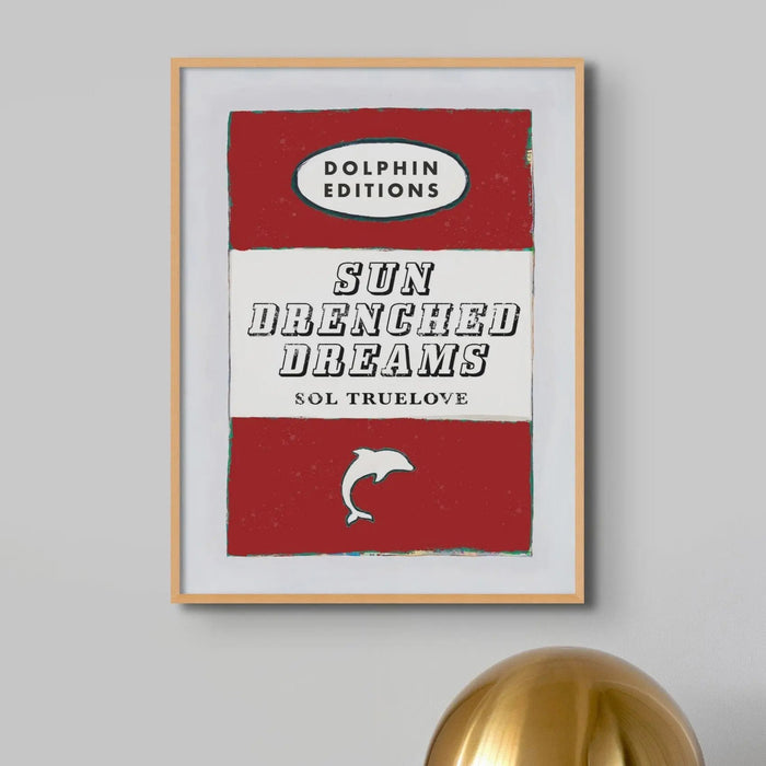 beautiful vintage book cover art print titled "Sun Drenched Dreams" in red. It's framed and would make a lovely addition to any space.