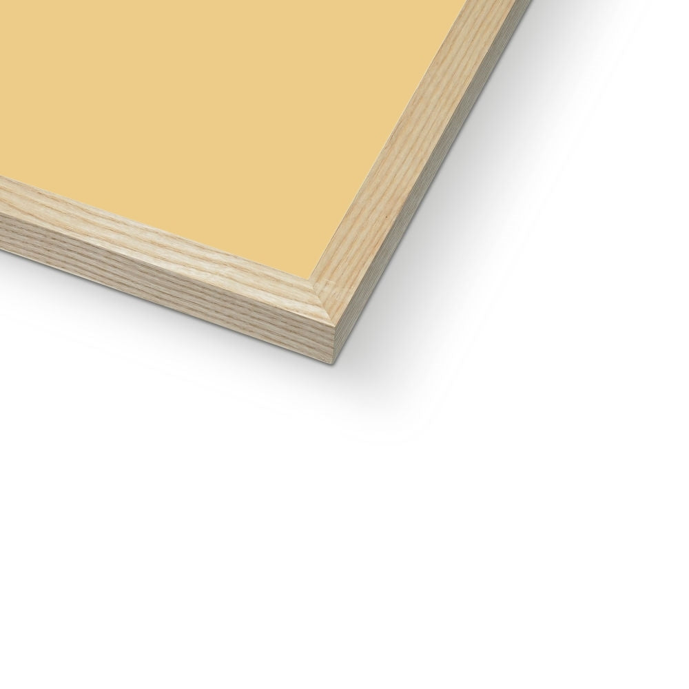 Close-up of a yellow sheet with wooden border on a white background