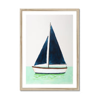 Framed artwork of a sailboat with blue sails on a light green background