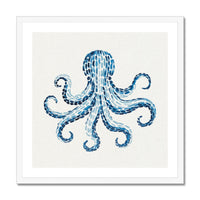 Framed artwork of a blue octopus on a white background