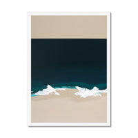 Framed artwork of a beach scene with blue water and beige sand.