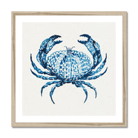 Framed artwork of a blue crab on a white background