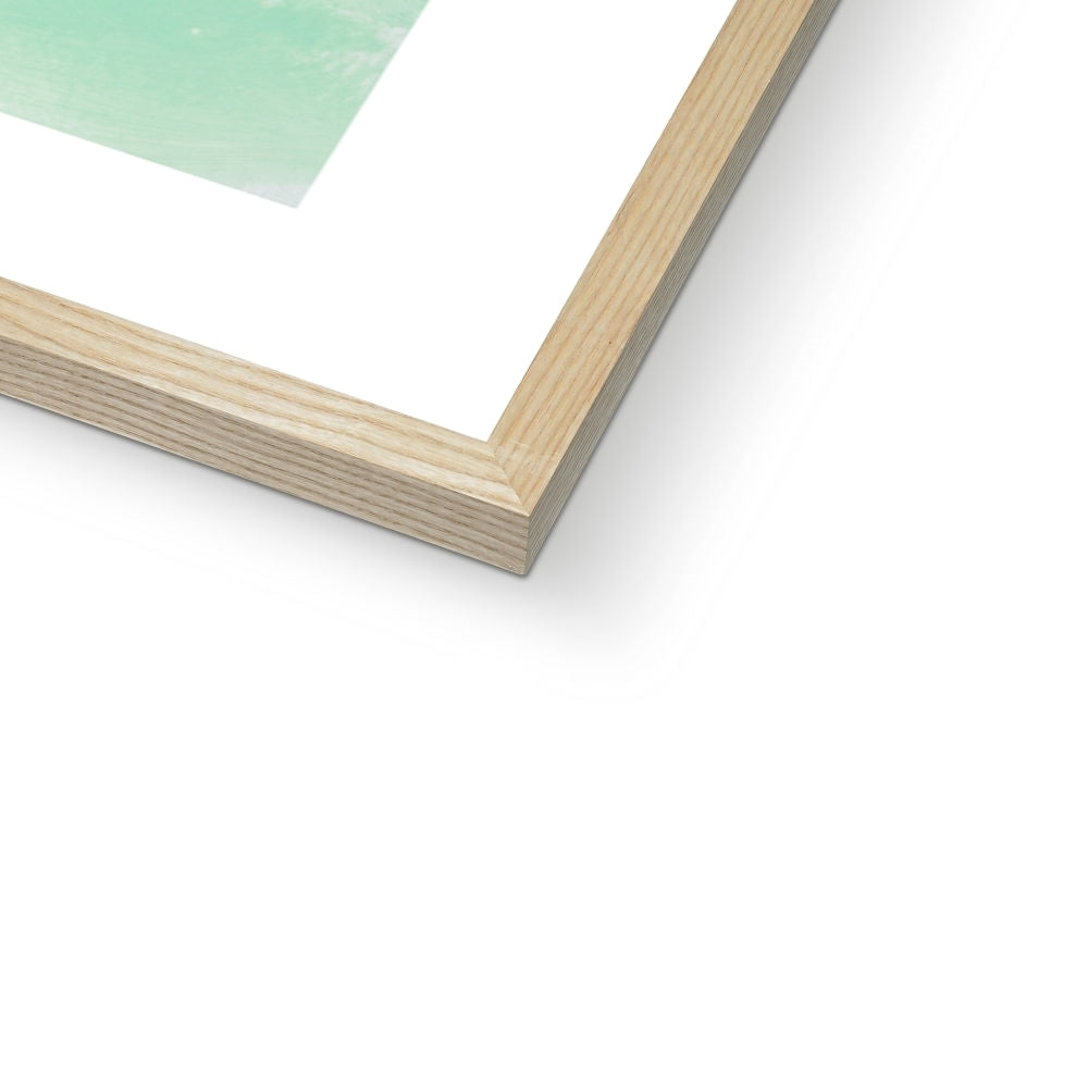 Close-up of a wooden picture frame corner on a white background