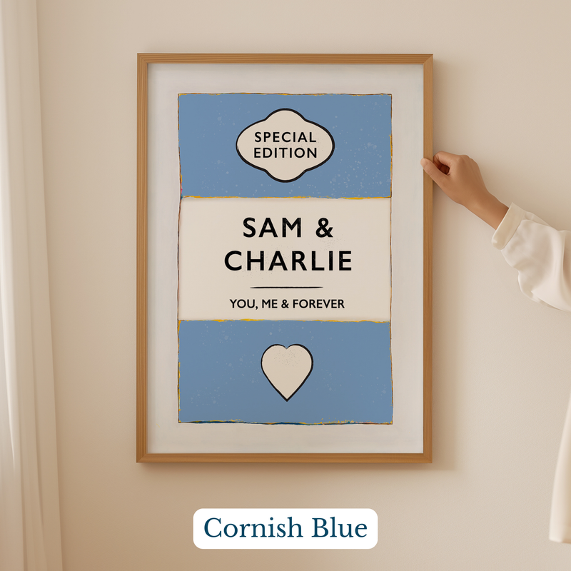 Personalised wedding/engagement print. Framed artwork with 'Sam & Charlie' text and 'Cornish Blue' color on a beige wall.