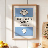 Personalised family name print -Framed print titled 'The Harris Family' on a kitchen counter with a bowl of lemons and a vase.