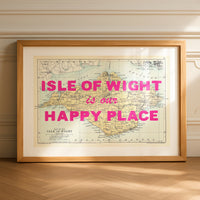 Framed map of isle of wight with 'Isle of wight is our happy place' text on a wall.