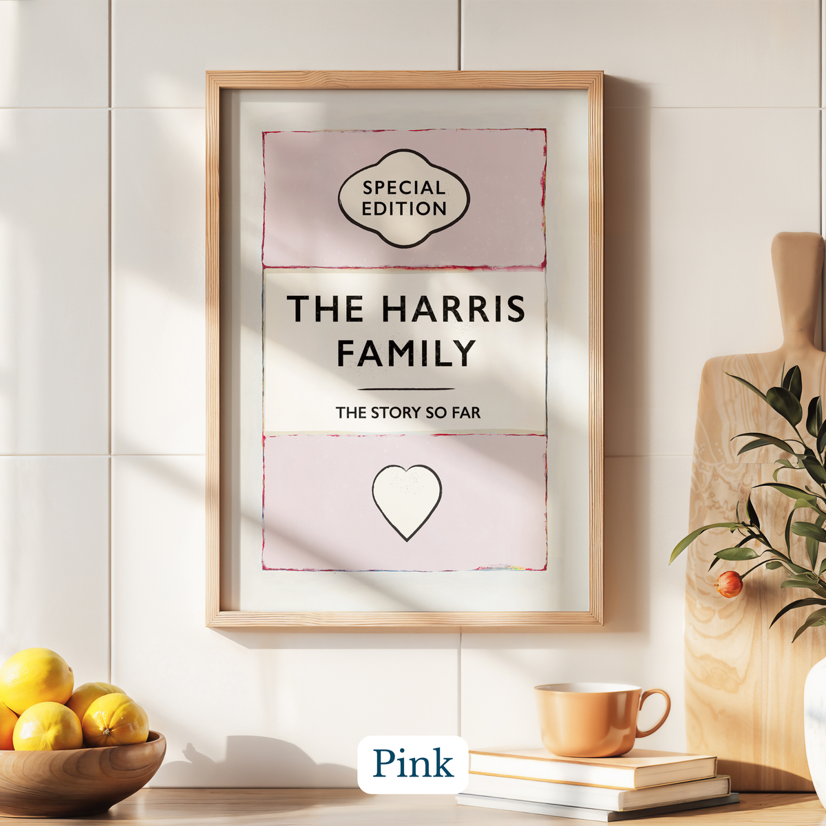 Personalised family name print - Framed print titled 'The Harris Family' on a wall with decor elements below.