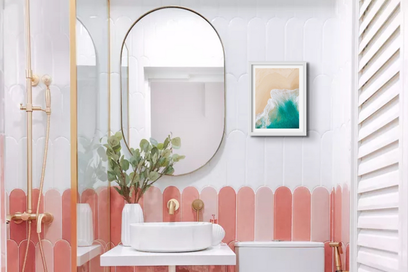 Aerial Beach photograph as a bathroom art print in a pink tiled bathroom