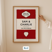 Personalised wedding/engagement print. Couple Print. Framed artwork with 'Special Edition' and 'Sam & Charlie' text on a red and white background, held by a person.
