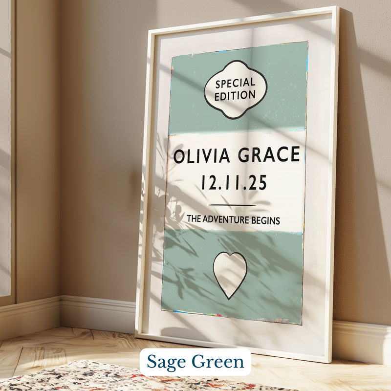 Personalised baby name print - Framed artwork with 'Olivia Grace' and date on a light green background, leaning against a wall.