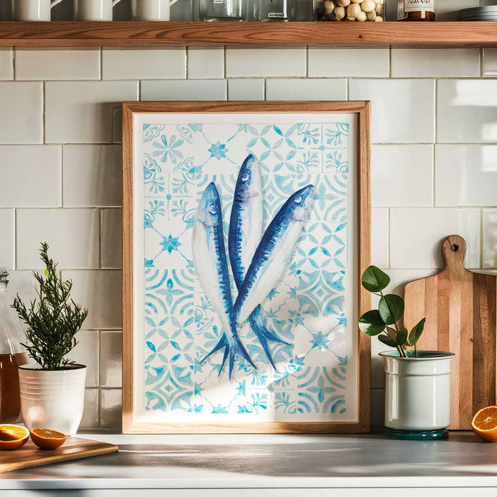 fish painting in kitchen - framed kitchen art print. Framed artwork of blue fish on a kitchen counter with plants and a cutting board.