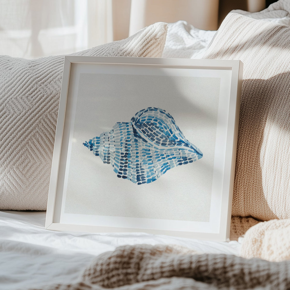 Conch shell painting with layered blue brushstrokes on a neutral background, contemporary coastal wall art in bedroom