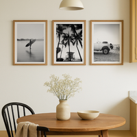 set of three framed black and white photography prints in kitchen