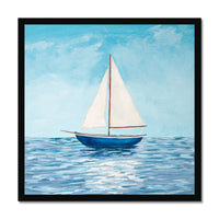 Framed artwork of a sailboat on water with a blue sky.