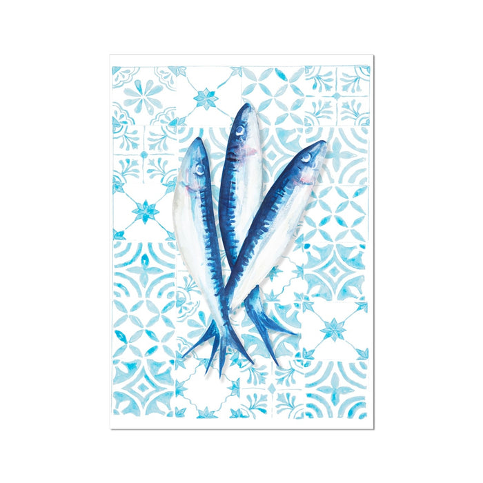 Two blue fish on a decorative white and blue patterned background