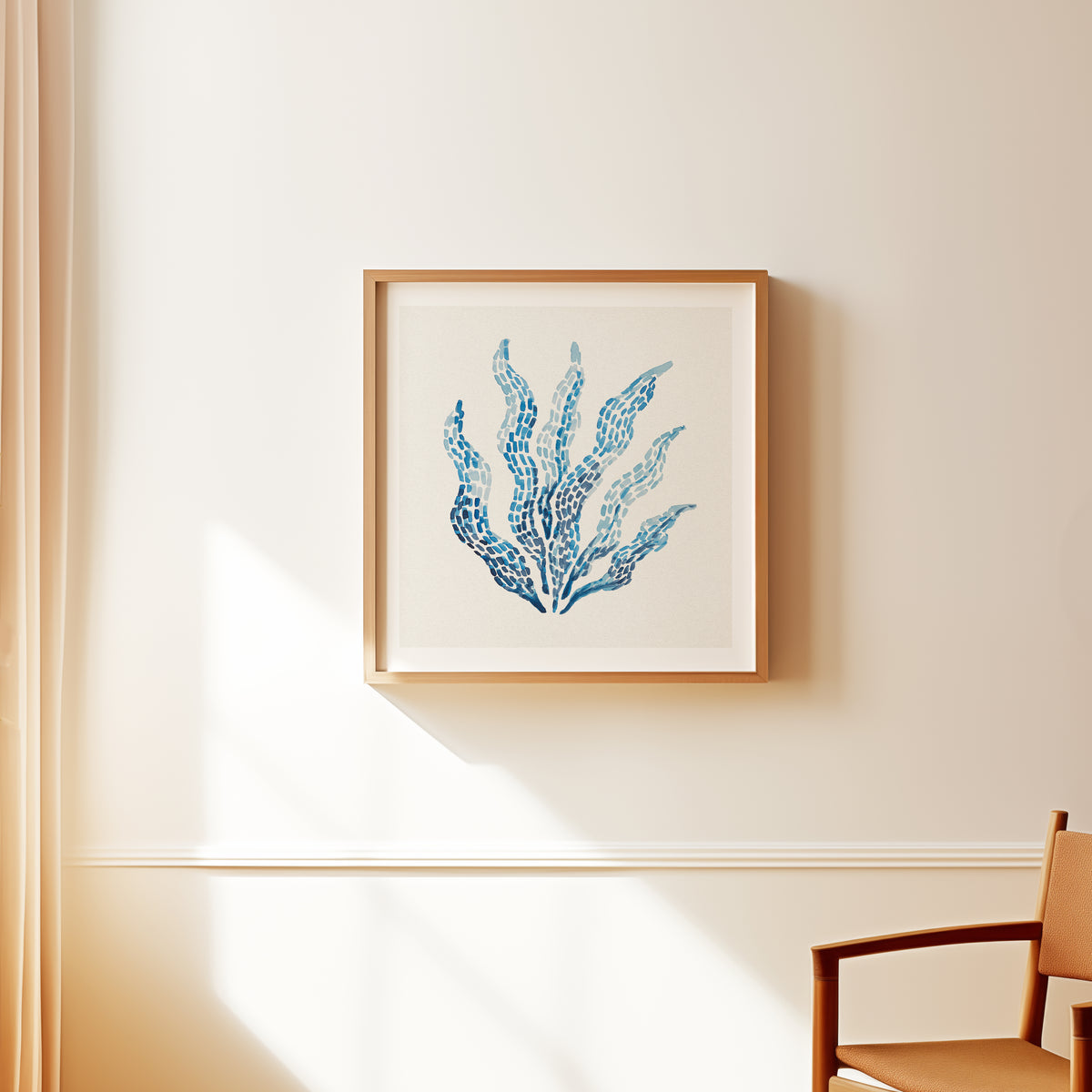 Seaweed wall art print with layered blue brushstrokes on a neutral background, contemporary coastal wall art, framed with natural wood frame