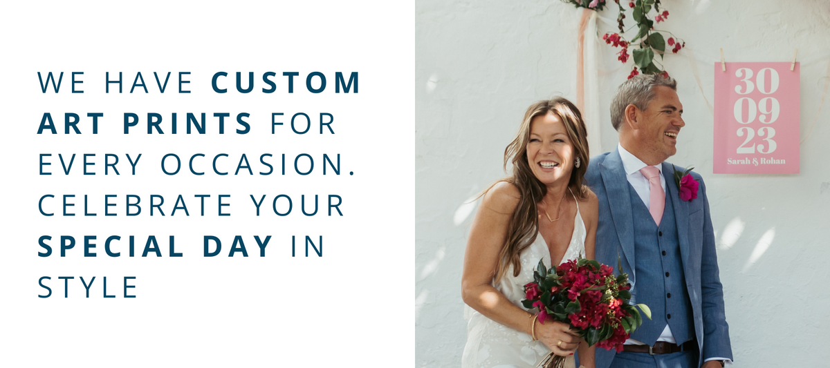 couple getting married in front of a custom date wedding art print - custom engagement art print