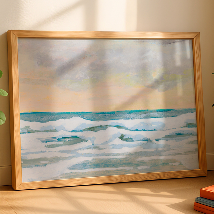 Seascape painting of waves at dusk with soft peach sky and blue sea in wooden frame