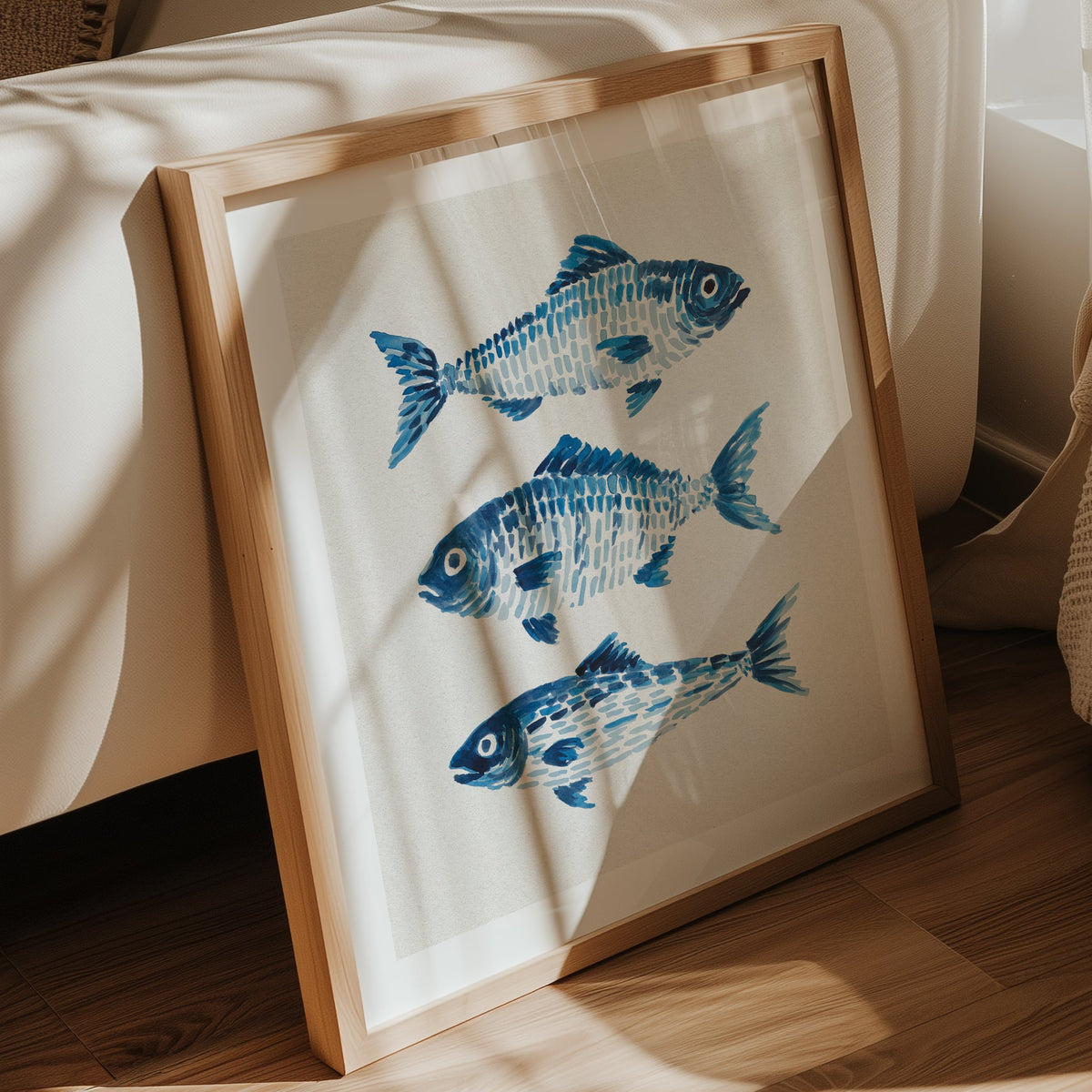 Frame fish art print in living room by sofa 