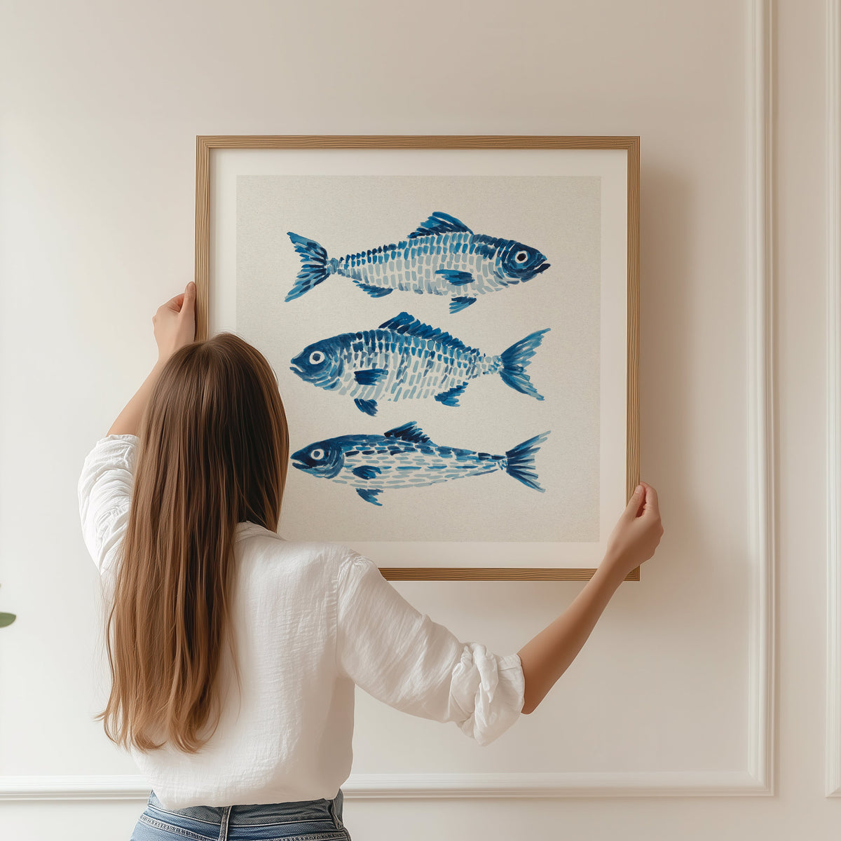 Framed fish painting on wall in living room