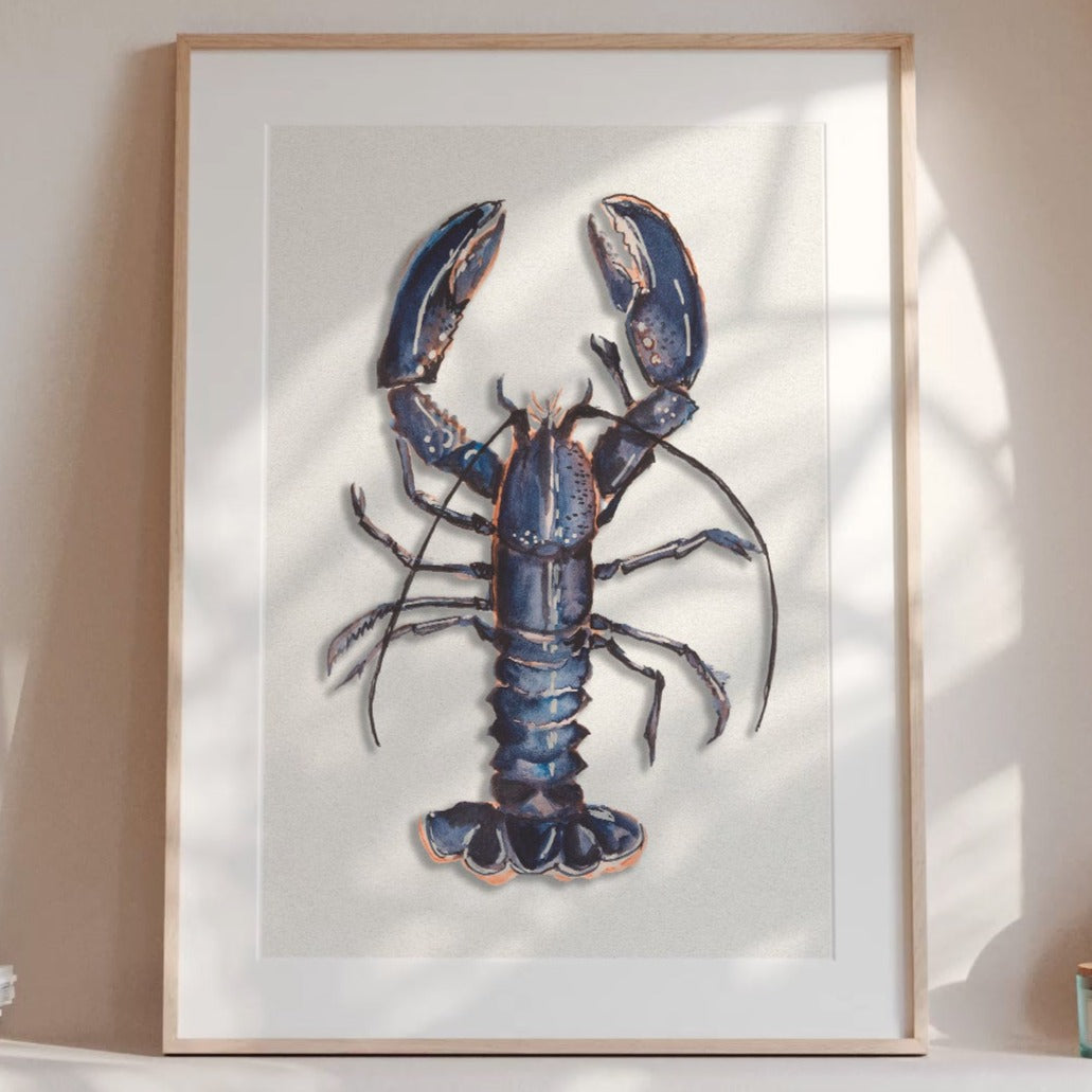 Blue lobster wall art print in a natural wood frame