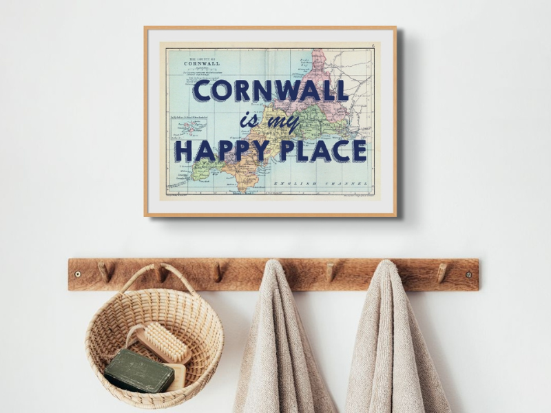 hallway wall art - vintage map print in hallway above coat hooks in entrance to home