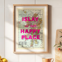 Framed map of Islay with 'Islay is our happy place' text on a wall.