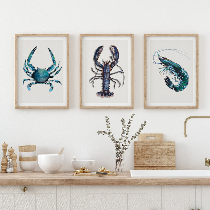 set of three food art prints on wall in kitchen - set of shellfish prints framed in natural frames in kitchen