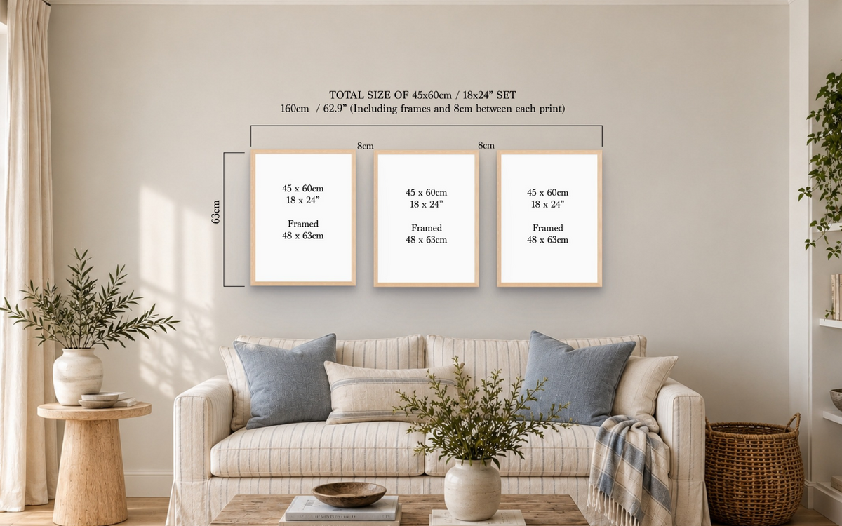A living room scene showing three framed art prints mounted on a beige wall above a sofa. The image includes dimension callouts indicating a total size of 45x60cm / 18x24" set, with individual print sizes labeled 45 x 60cm, 45 x 60cm, and 45 x 60cm, plus 8cm and 60cm spacing measurements.