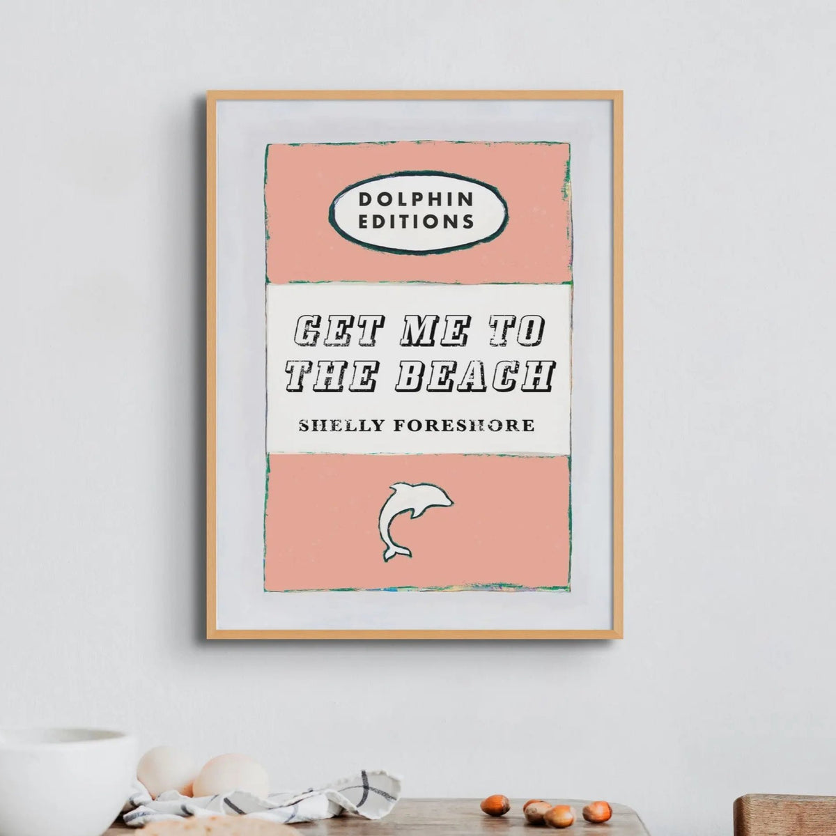 Vintage Book Cover Art Print titled "Get Me to the Beach" in peach colour and framed.