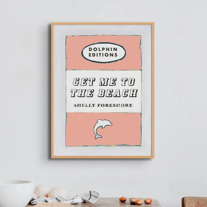 Vintage Book Cover Art Print titled "Get Me to the Beach" in peach colour and framed.