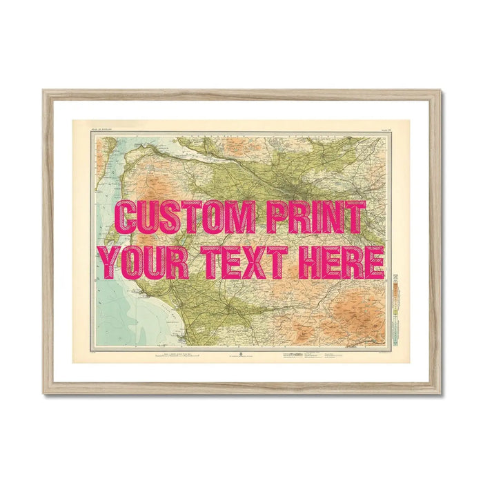 A framed custom map print of Glasgow with a pink vintage font, showing a section of the map with various shades representing different areas, and text placeholder saying 'CUSTOM PRINT YOUR TEXT HERE'.