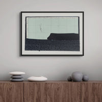 Beach House Art | Headland Point Print | Modern Seascape Painting in black frame above a teak desk with designer pots and vases