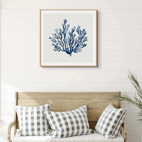 This artwork features a lovely indigo shell art print, beautifully framed for display on any wall